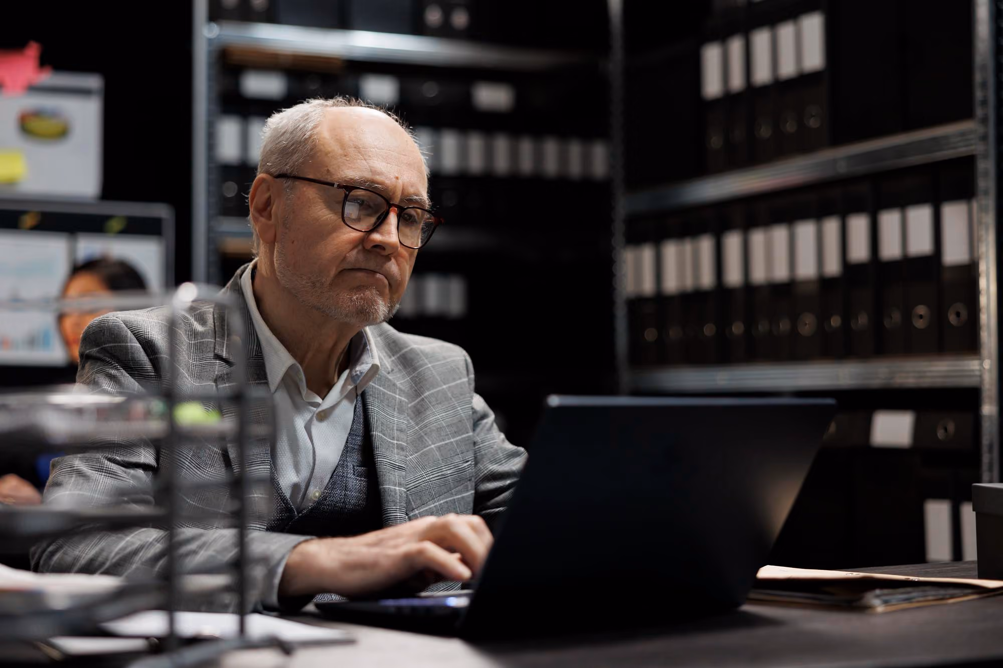 Business owner working on a laptop in an office