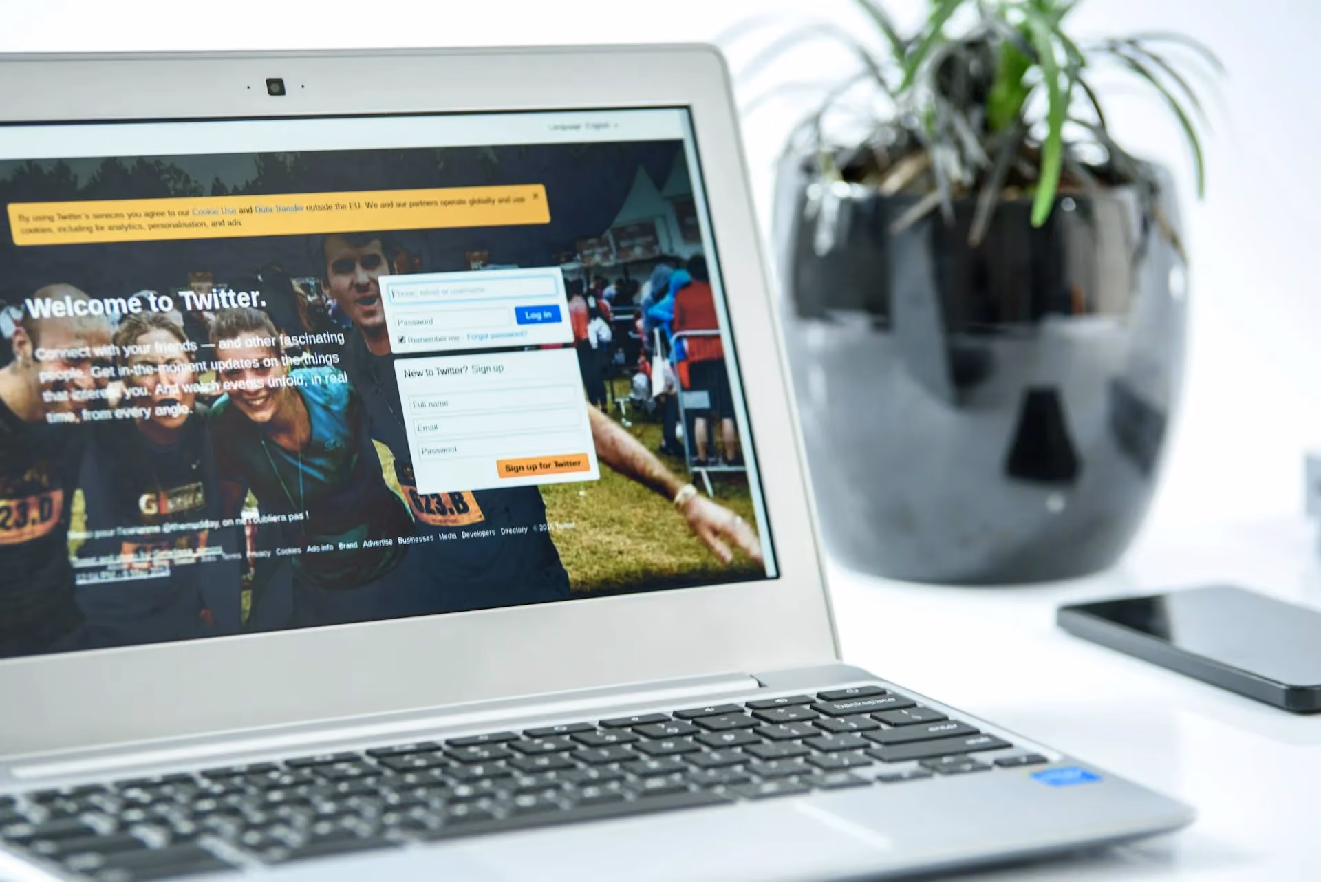 Laptop on a desk with a web browser open